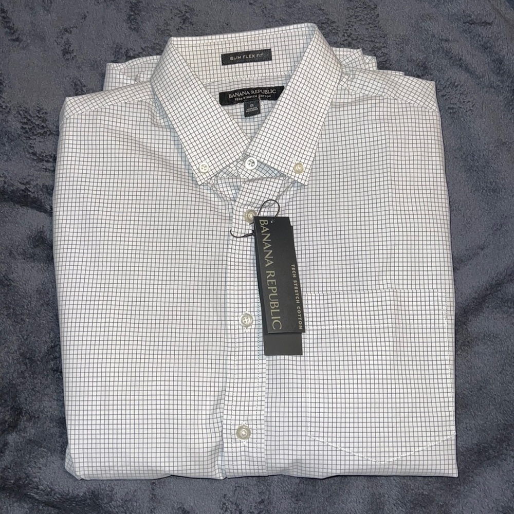 Banana Republic size small (slim fit flex). White with blue square print. New.